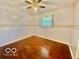 Bright bedroom with hardwood floors and a cozy atmosphere at 301 Barton Ave, Indianapolis, IN 46241