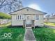 Charming single-story home with a well-maintained lawn and inviting front entrance at 301 Barton Ave, Indianapolis, IN 46241
