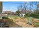 Spacious backyard with a wooden deck and storage shed at 318 Camby St, Greenwood, IN 46142