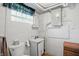Basement bathroom with toilet and utility sink at 318 Camby St, Greenwood, IN 46142