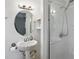 Cozy bathroom featuring pedestal sink and a shower stall at 318 Camby St, Greenwood, IN 46142