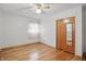 Bedroom with hardwood floors and a closet with mirrored door at 318 Camby St, Greenwood, IN 46142
