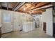 Basement laundry room with appliances and utility sink at 318 Camby St, Greenwood, IN 46142