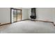 Spacious living room with a fireplace, slider door access to a deck at 318 Camby St, Greenwood, IN 46142
