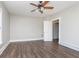This bedroom features wood-look flooring and ceiling fan at 3241 N Capitol Ave, Indianapolis, IN 46208