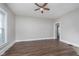 Spacious living room with hardwood floors and plenty of natural light streaming through the window at 3241 N Capitol Ave, Indianapolis, IN 46208