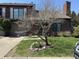 Charming brick townhouse with a balcony, chimney and well-kept front yard at 346 E St Clair E St, Indianapolis, IN 46202