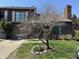 Charming brick townhouse with a balcony, chimney and well-kept front yard at 346 E St Clair E St, Indianapolis, IN 46202