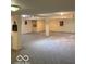 Spacious finished basement with gray carpeting, neutral walls, and ample lighting at 3504 Inverness Blvd, Carmel, IN 46032