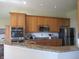 Stylish kitchen with granite countertops and stainless steel appliances at 3504 Inverness Blvd, Carmel, IN 46032