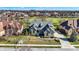 Expansive aerial view showcasing the home's location, manicured lawn, and proximity to the surrounding neighborhood at 3582 Pete Dye Blvd, Carmel, IN 46033
