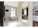 Spa-like main bathroom with soaking tub and walk in closet at 3582 Pete Dye Blvd, Carmel, IN 46033