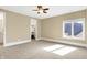 Spacious bedroom featuring carpet, natural light, and walk-in closet, perfect for comfortable living at 3582 Pete Dye Blvd, Carmel, IN 46033