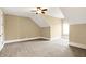 Neutral bedroom with carpet, a ceiling fan, and windows bringing in lots of natural light at 3582 Pete Dye Blvd, Carmel, IN 46033