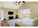 Large primary bedroom with lots of windows providing ample natural light at 3582 Pete Dye Blvd, Carmel, IN 46033