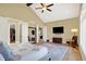 Vaulted ceiling in the primary bedroom, with views to the ensuite and walk-in closet at 3582 Pete Dye Blvd, Carmel, IN 46033