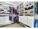 Spacious walk-in closet with adjustable shelving and multiple storage solutions at 3582 Pete Dye Blvd, Carmel, IN 46033