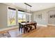 Bright dining area with elegant light fixture and bench seating at 3582 Pete Dye Blvd, Carmel, IN 46033