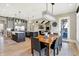 Open concept living with dining area open to a gourmet kitchen and living room at 3582 Pete Dye Blvd, Carmel, IN 46033