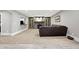 Spacious basement living room with a fireplace and a comfortable seating area for entertainment at 3582 Pete Dye Blvd, Carmel, IN 46033