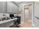 Dedicated home office space with custom cabinets and granite countertops at 3582 Pete Dye Blvd, Carmel, IN 46033