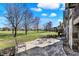 Elegant backyard patio with stylish seating, perfect for outdoor relaxation and entertaining at 3582 Pete Dye Blvd, Carmel, IN 46033