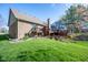 Well maintained brick home featuring an expansive backyard, deck and stone landscaping at 4063 Millstream Rd, Greenwood, IN 46143