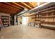 Unfinished basement with shelving and storage space ready for customization at 4063 Millstream Rd, Greenwood, IN 46143