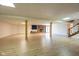 Finished basement boasting a fireplace, wood flooring, and staircase for convenient access to the home above at 4063 Millstream Rd, Greenwood, IN 46143