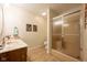 Bathroom featuring framed art, shower with sliding glass doors, and vanity at 4063 Millstream Rd, Greenwood, IN 46143