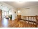 Open foyer featuring hardwood floors, staircase, and views of the living spaces at 4063 Millstream Rd, Greenwood, IN 46143