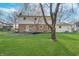 Expansive backyard with lush green lawn and patio, perfect for outdoor entertaining and relaxation at 4106 Armon Ct, Carmel, IN 46033
