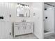 Newly renovated bathroom with a white vanity and modern shower at 4106 Armon Ct, Carmel, IN 46033