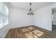 Dining room featuring hardwood floors and natural lighting at 4106 Armon Ct, Carmel, IN 46033