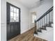 Bright foyer with hardwood floors and stairway at 4106 Armon Ct, Carmel, IN 46033