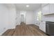 Bright kitchen showcases white cabinets, stainless appliances, and an open layout at 4106 Armon Ct, Carmel, IN 46033