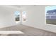 Spacious bedroom with three large windows providing ample natural light and plush carpet at 4327 Persian St, Greenwood, IN 46143