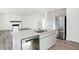 Kitchen island with stainless steel appliances and an open concept design at 4327 Persian St, Greenwood, IN 46143