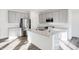Modern kitchen with stainless steel appliances, granite countertops and island at 4327 Persian St, Greenwood, IN 46143