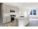 Modern kitchen with stainless steel appliances, granite countertops and island at 4327 Persian St, Greenwood, IN 46143