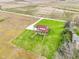 Bird's eye view of a home nestled in a tranquil, rural setting, surrounded by ample green space and open fields at 4339 W Briarwood Rd, Monrovia, IN 46157