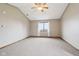 Spacious bedroom with plush carpeting, neutral walls, and a ceiling fan for climate control at 4339 W Briarwood Rd, Monrovia, IN 46157