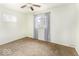 Bedroom featuring light green walls, carpet flooring, and one window at 438 Park Dr, Greenwood, IN 46143