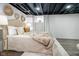 Finished basement bedroom with dark ceiling and luxury decor at 4719 Evanston Ave, Indianapolis, IN 46205