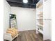 Spacious closet with shelving and a mirror at 4719 Evanston Ave, Indianapolis, IN 46205