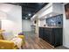 Finished basement with wet bar and extra seating at 4719 Evanston Ave, Indianapolis, IN 46205