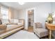 A cozy bedroom featuring a daybed, chair, and a view into the closet at 4719 Evanston Ave, Indianapolis, IN 46205
