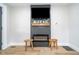 Modern fireplace creates a warm ambiance, complemented by stylish decor and clean lines at 4719 Evanston Ave, Indianapolis, IN 46205