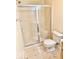 Neutral bathroom features toilet, shower, and vanity with cabinet storage at 5129 W Preakness Ct, Muncie, IN 47304