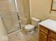 Bathroom features toilet, shower, and vanity with cabinet storage at 5129 W Preakness Ct, Muncie, IN 47304